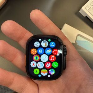 Apple Smartwatch ULTRA 2
Titanium Case
Dark Gray Band (Brand New) with charger.